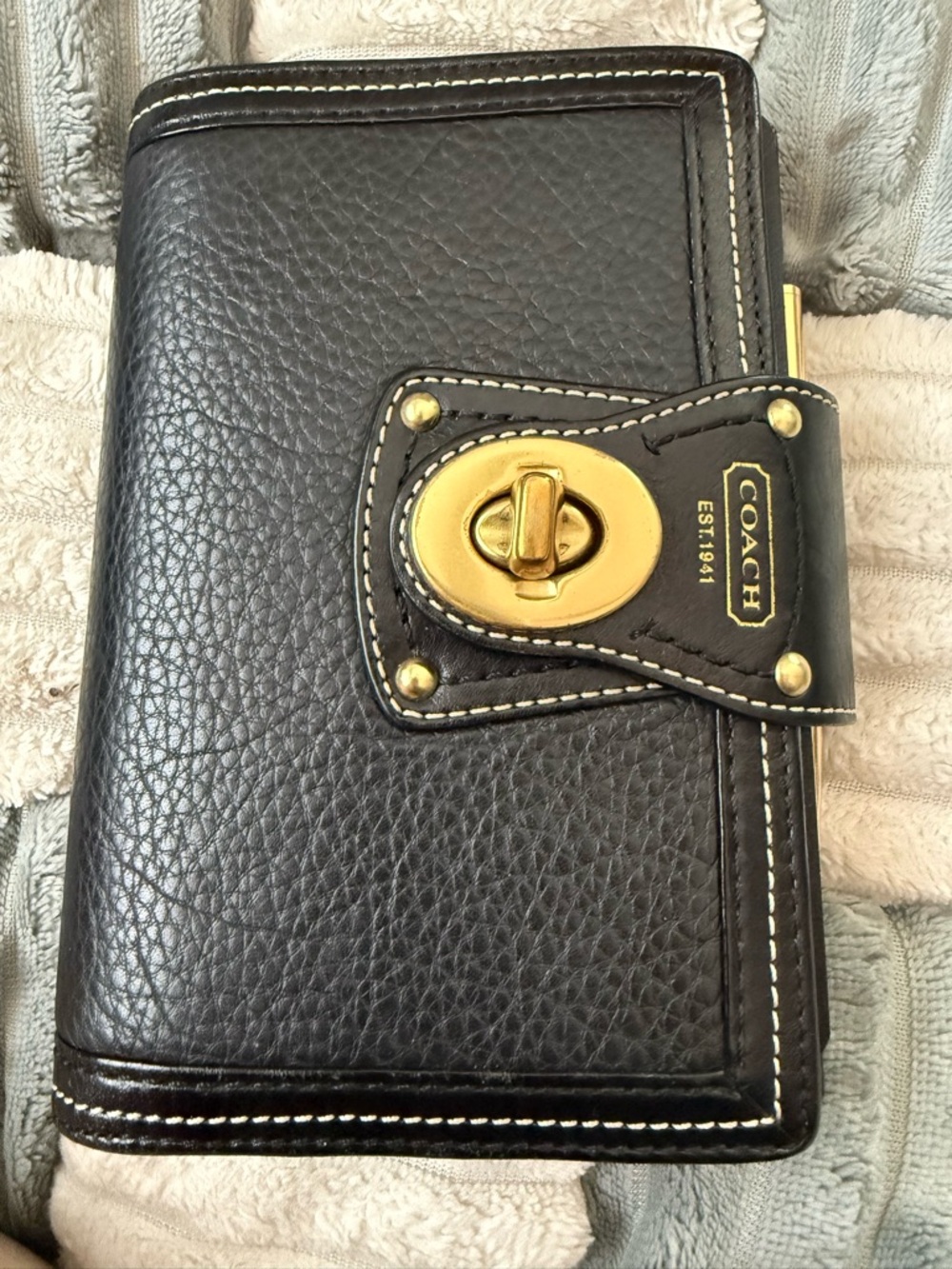 Sold-Coach vintage in great condition with original pen.